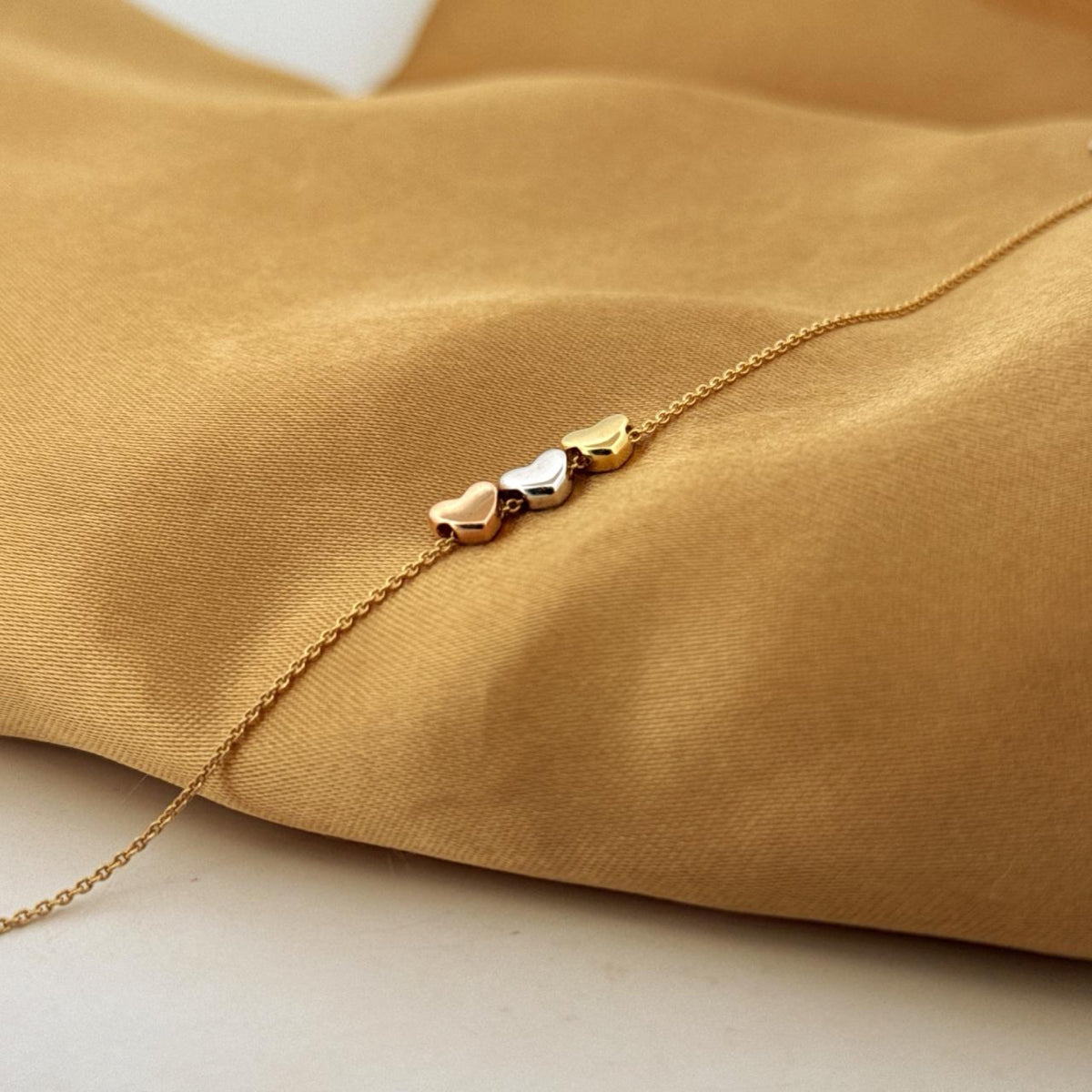 Sterling 92.5 Silver Tri-Tone Hearts Gold-Plated Bracelet for Women