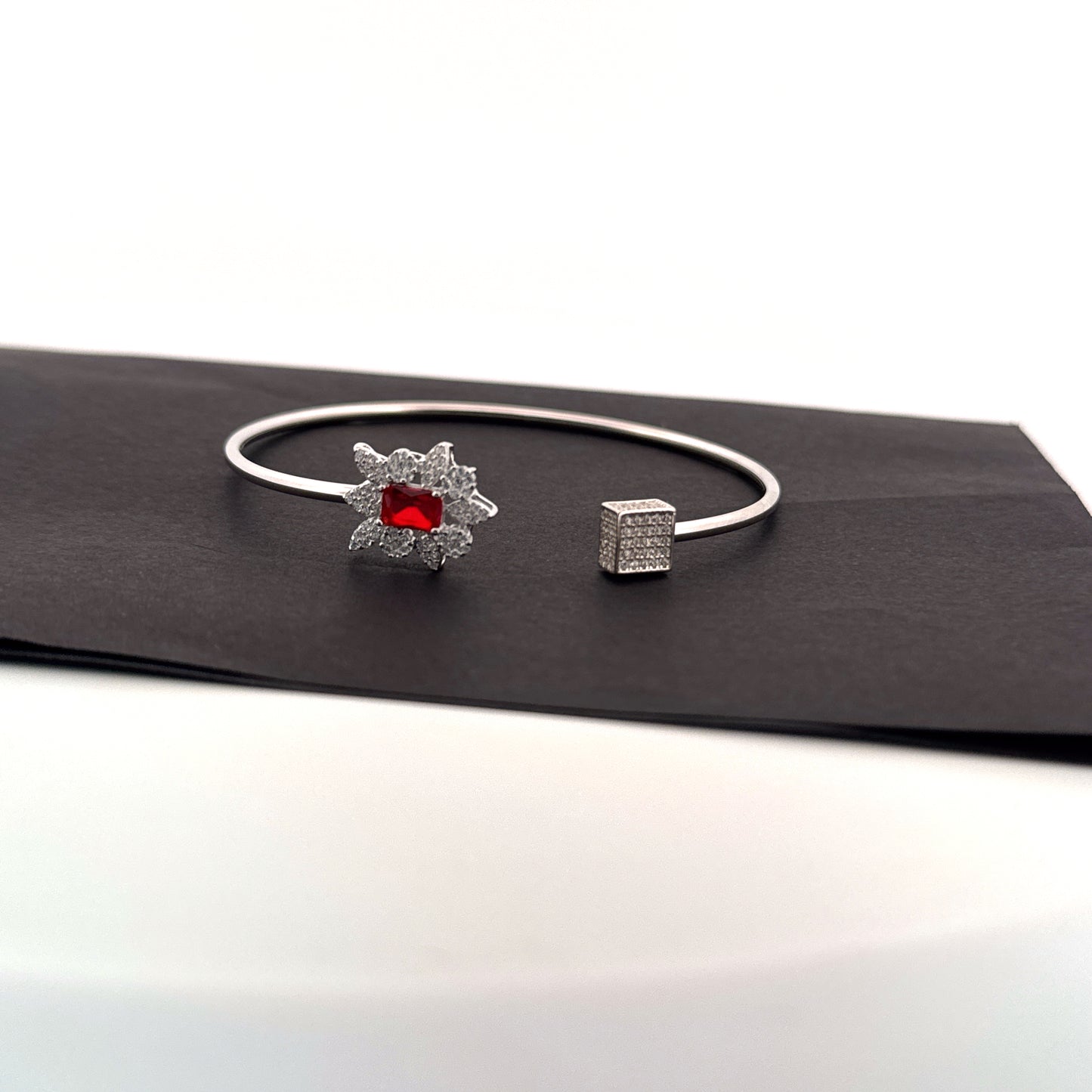 Synthetic ruby & white AD 925 silver bypass bangle — bold geometric contrast for weddings. - image 1