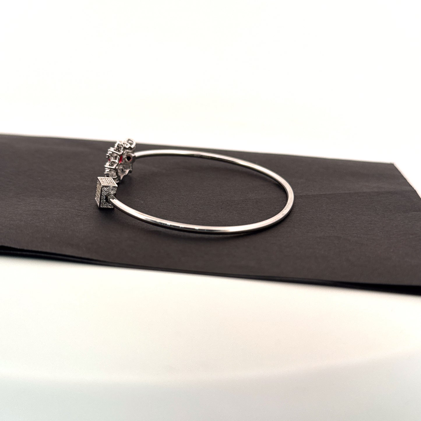 Synthetic ruby & white AD 925 silver bypass bangle — bold geometric contrast for weddings. - image 2