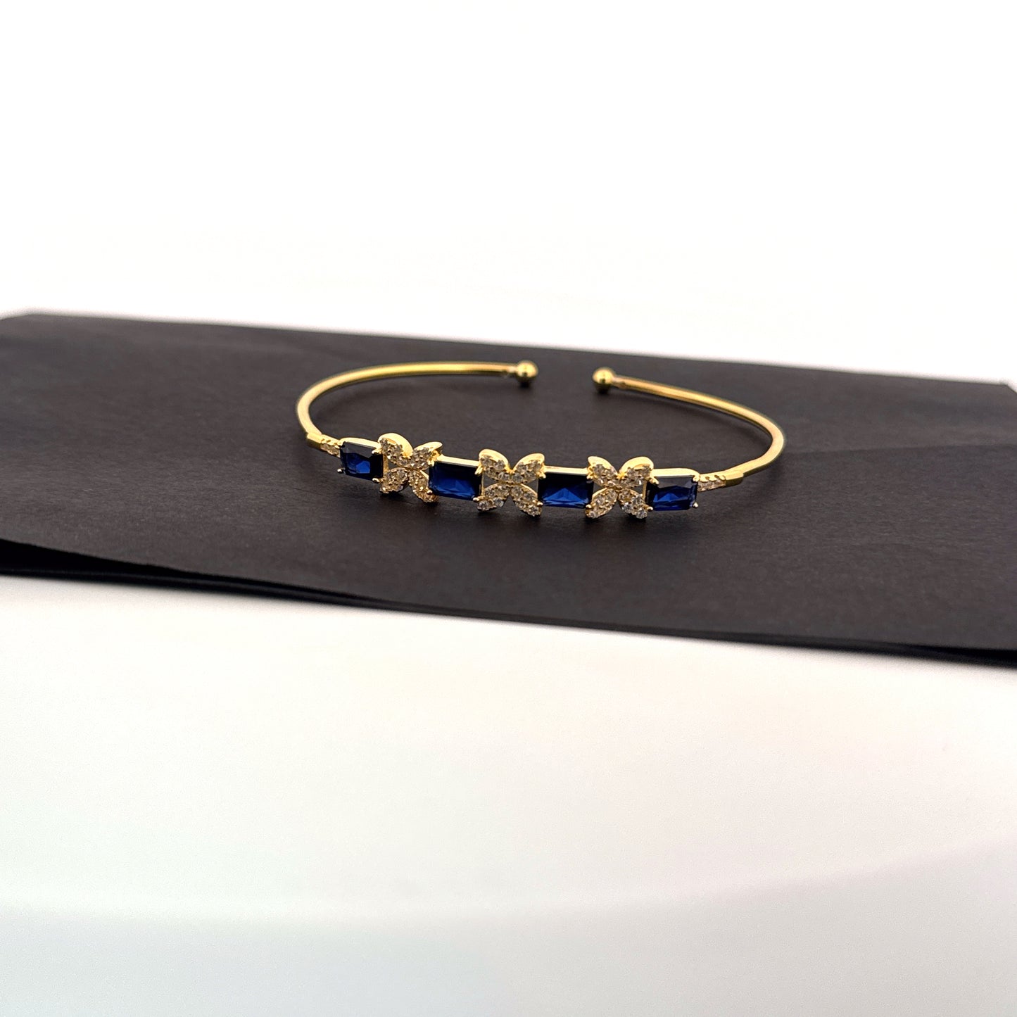 Synthetic blue sapphire baguette 925 silver gold butterfly cuff — vivid festive statement bangle. - image 1