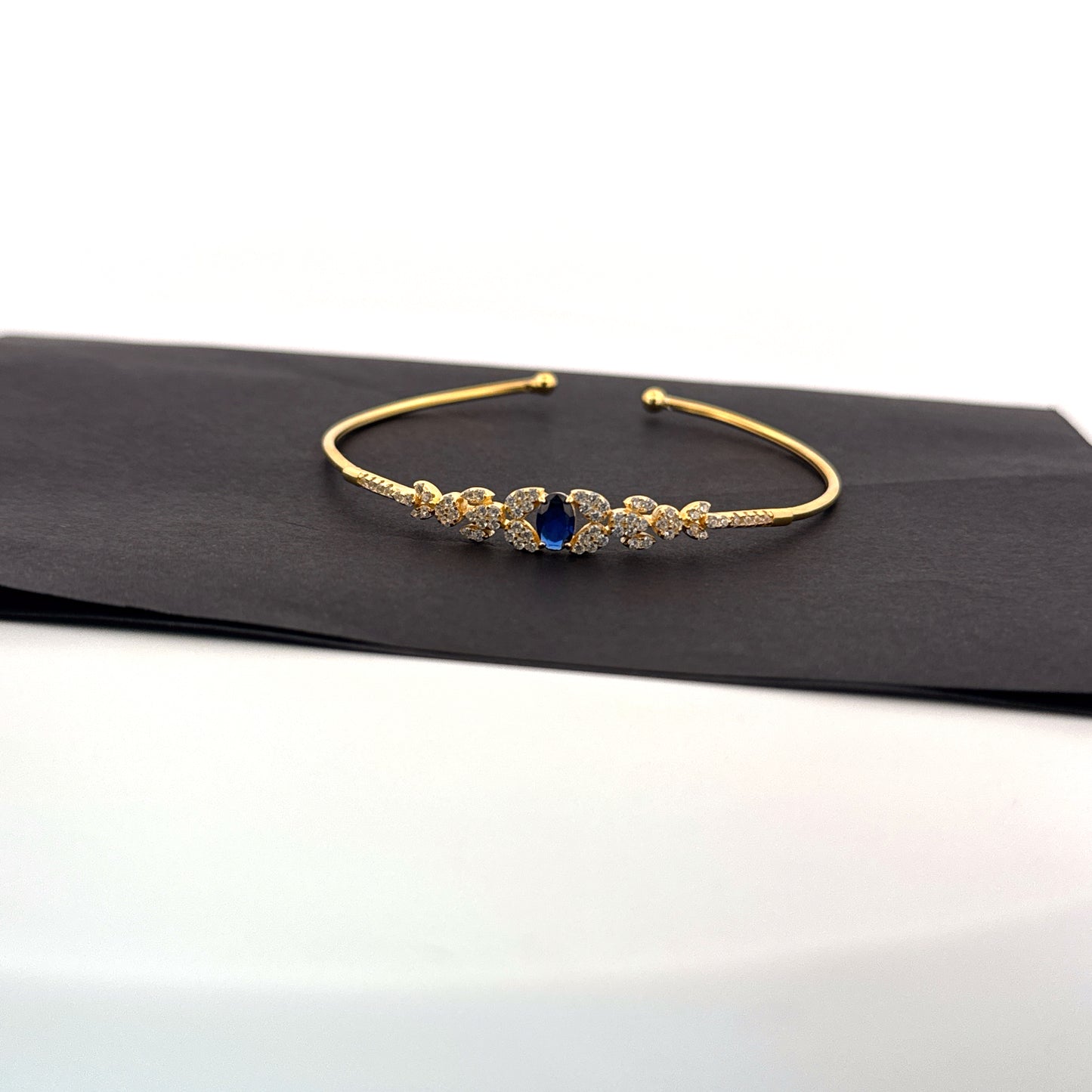 Synthetic blue sapphire & white AD stone gold-plated 925 silver cuff bangle — festive and wedding elegance. - image 1